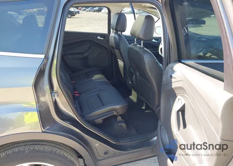 2017 Ford Escape Titanium z USA, uszkodzony, nr VIN 1FMCU9JD2HUA17583